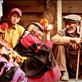 As the day's festivities draw to a close, an elderly Kalash couple surrounded by grandchildren sit on the verandah of their home for a chat. They may be reminiscing about better days, when they were younger, their numbers greater - in the 1951 census of Pakistan, the Kalash population was recorded at 10,000, which by 2012 had dropped to 3,700. They may be ruing the safety of their community, which not only faces pressure to assimilate from their Muslim neighbors, but has also been threatened by the militant Pakistani Taliban. 
<p>
They may be lamenting the gradual loss of their oral traditions. Most Kalash children today go to public schools, where they learn Urdu, the national language of Pakistan. The elders, however, only speak the native Kalasha, according to some scholars the closest modern tongue to Ancient Sanskrit.
<p> 
Although the Pakistani government has applied for UNESCO World Heritage status for the Kalash people, one wonders how long this fabled community can hold together. How much longer can they can preserve their ancient ways, their secrets, thus far protected by the forbidding Hindu Kush, dating to a time and place that only exists in legend? Views[385]