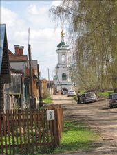 Walking down the dirt streets of the village Plyos. Viewing rows of old wooden homes,  tree lined streets, and beautiful monasterys in the distance. : by mangbo, Views[358]