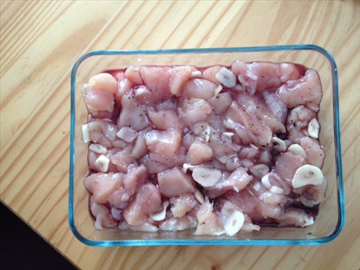 Seasoning the chicken cubes