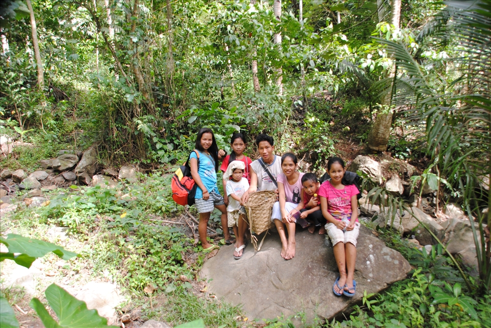 MANGYAN FAMILY - One kilometer away from home, this Mangyan family bought some provisions from the tiangge, a weekly village market on Thursdays. Historically, Mangyans are believed to be direct descendants of the Malays. Mountainous and forested lands are mostly ancestral properties of the Mangyans and such are acknowledged by the government. With the coming of the Spanish colonizers in the 16th century, they were driven away from the lowlands. Life in this rural community is hard. Livelihood is largely dependent on agricultural crops and subsistence is badly affected when long scorching summer sets in from March to late May.
Mostly Christians, they appreciate the importance of education, health practices and enjoy political liberties. The government preserves their culture and traditions.