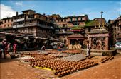 Pottery Square, Bhaktapur, Kathmandu.  These pottery squares are world renowned.  
Here pottery is a family job, the place is common for all the villagers. so everyone in the village work together. their mundane life is part of their religious life too. so even in the common places we can see the temples and buddha statue everywhere in the village. : by manikandanav, Views[1590]