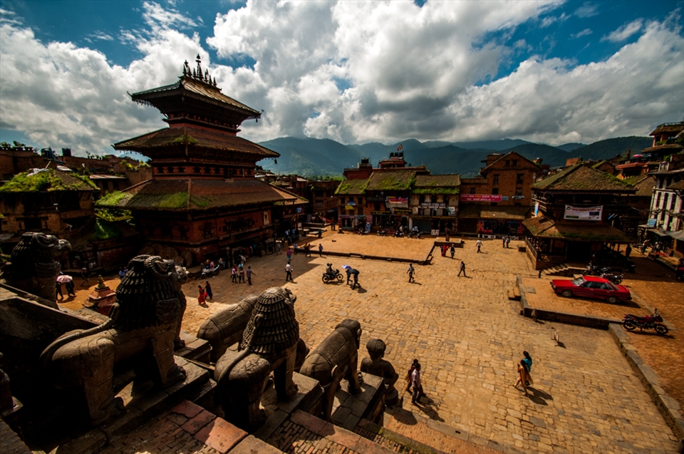 Dharbar Square, Bhaktapur, Kathmandu. This Monumental Darbar square was Malla kings darbar till 1769 BC. In one place we can see Monasteries, Pagodas, Palace and Temples together. Irrespective of its tourism developments the village has been kept without any modifications in its architecture beauty. what we see in the left corner is a restaurent in a old pagoda. Even in the 21st century the life happens  here in 17th century shadows.