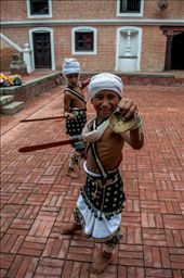 Kids practising for the mask festival called Intrajatra, a festival for Intra, god of rain. After every monsoon season they celebrate the festival to say thanks to indra.
Unlike other asian countries Nepal has never been contaminated with the thronging tourists. People still live a modest life, unchanged from their heritage. even these kids who are practicing the traditional dance were innocents without any inhibitions toward the tourists.     : by manikandanav, Views[541]