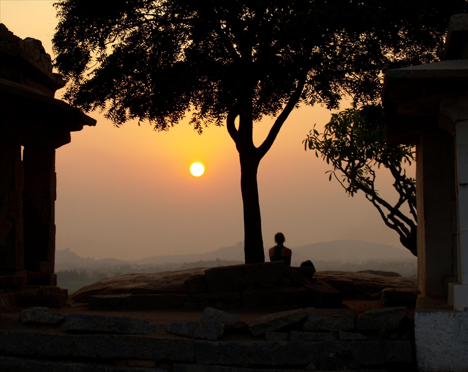 A lone observer for the sunset at Hampi