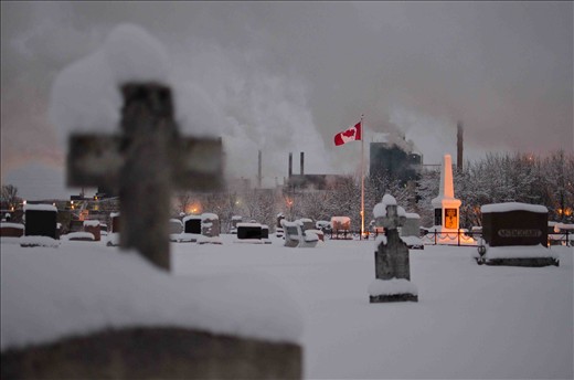 To the right of the Canadian flag stands a monument in honor of the soldiers who fought bravely in the Second World War between 1939-1945. 