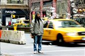 A Jamaican man sells bubble guns in a crossing-road of Midtown. The colorful bubbles clash with the grey of a winter afternoon. : by maoneira, Views[932]
