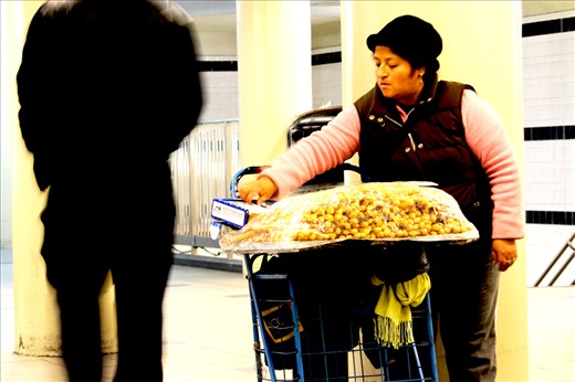 A Peruvian woman sells sweet 
