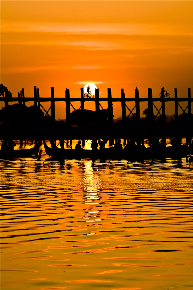 Sunset at U Bein Bridge longest teak bridge in the world, Amarapura, Myanmar