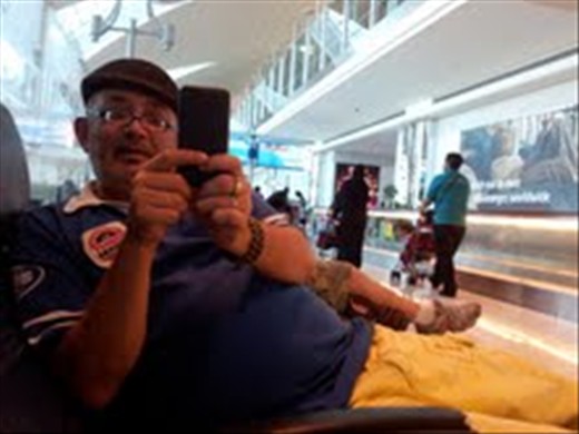 Jim taking a photo of me taking a photo of him at Dubai Airport
