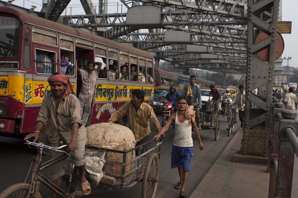 Traffic on the Howrah bridge,probably the busiest cantilever bridge in the world