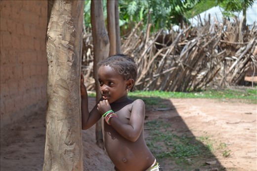 One of the 10 children in farmer's family of tribe Balanda. Village near Bissau.