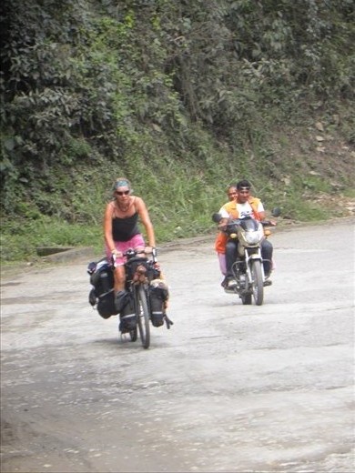 tough riding on the partially paved roads, sometimes in the rain.