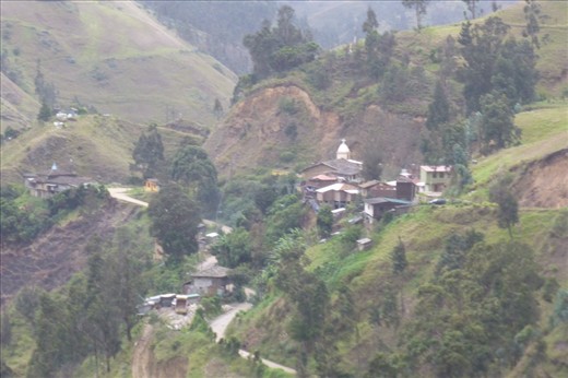 following the river on the muddy road to Loja.