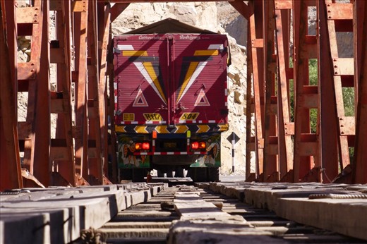 truck stuck on a flimsy bridge.
