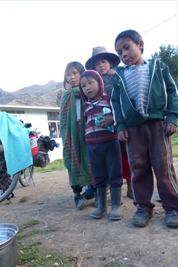 camping at a village school on the way to another pass....curious eyes follow our every move.