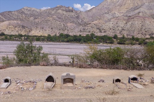 dried out graves on the side of the road.