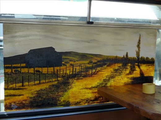 this painting in the restaurant bus was lid up by the sun through the window - great effect!