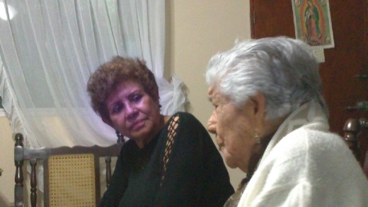 Over 150 years of cuisine knowledge: my grandma Emma and her neighbor, Caritina (R.I.P.).