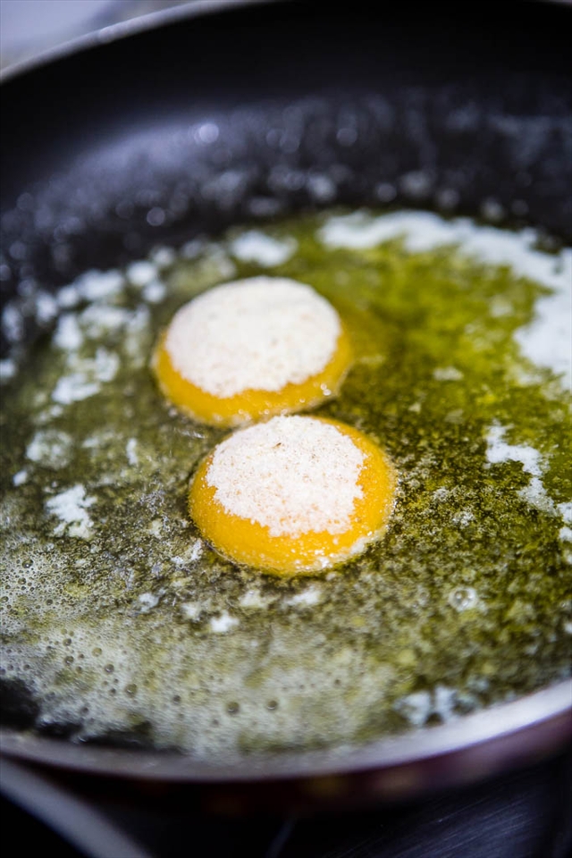 Yolks frying on butter