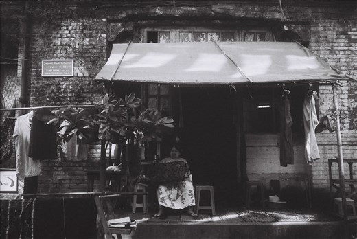 In a run-down colonial building, she's making a living.