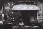 In a run-down colonial building, she's making a living.: by marielle, Views[307]