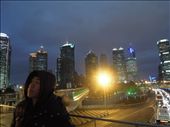Angel Zhou Lin admires the Shanghai skyline on a cold night in February. Angel is an architecture graduate from Spain where his parents immigrated the year he was born. After little success finding a job in Spain, he is now back in his parent's homeland studying Mandarin Chinese. : by marietornquist, Views[729]