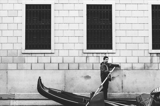 Gondola drivers, eager to book a drive on a rainy day, slowly loose their faith.