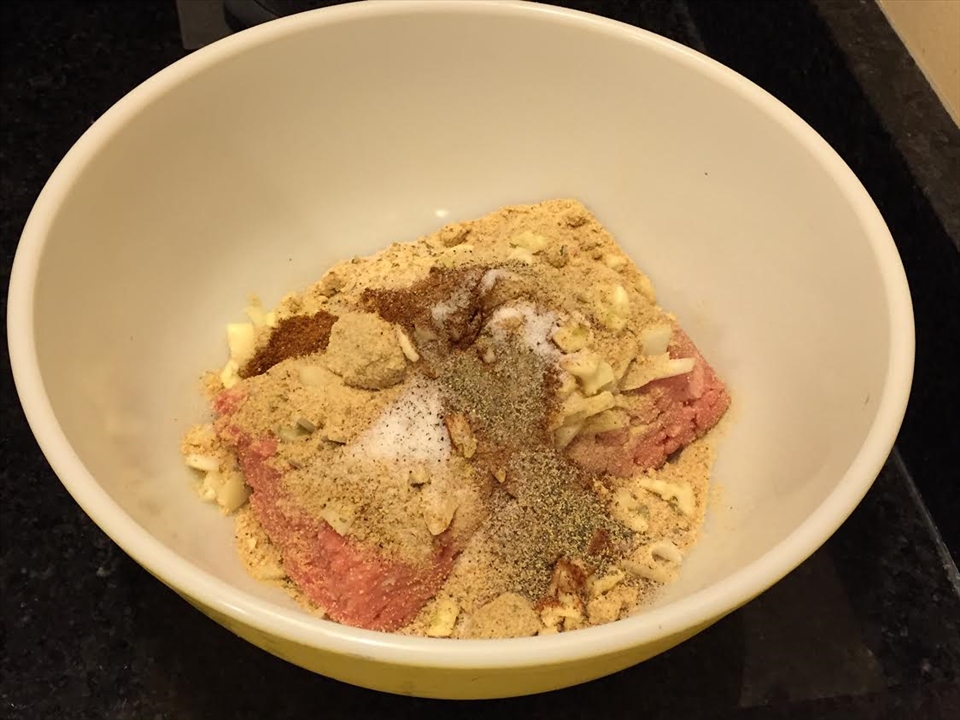 Step 2: Combine minced meat, onions, bread crumbs, garlic, salt, pepper and spices.  