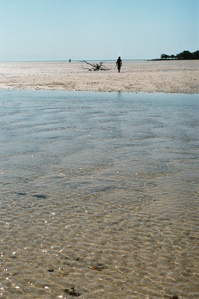 Walking back with the high tide
