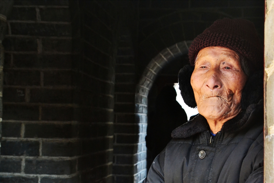 the eyes and wrinkles that tell the story of an old wise man, essence of China