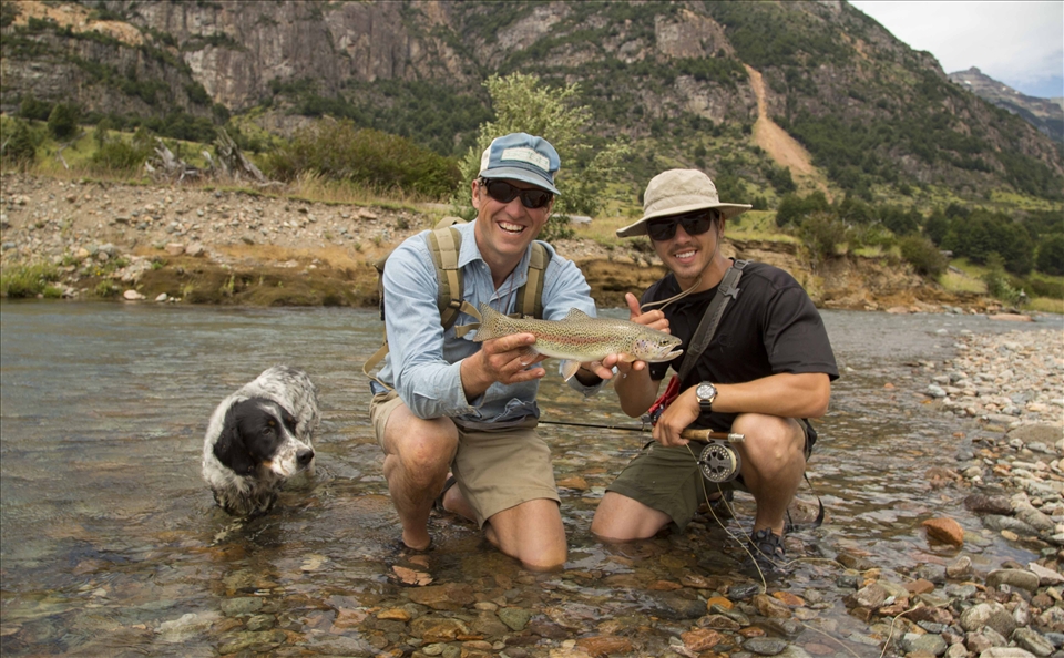 In the morning, we all piled in the truck with dogs and fishing gear and drove down to the river. Brad and Jess taught us the basics of casting, as the dogs ran along the banks sniffing for wildlife. By mid-afternoon, Rex and I each caught our first fish. Here, Brad holds Rex’s trout. It is these spontaneous invitations that make some of the most memorable travel experiences and the best ‘short rides up the road.’