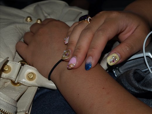 My seat mate's finger nails