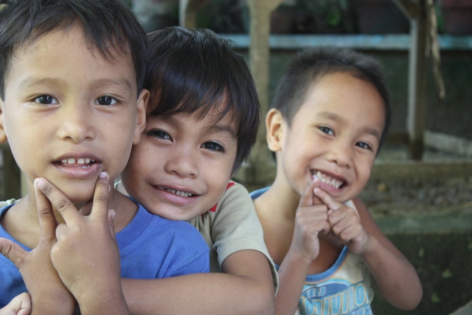 Innocent smiles yet there's more in their eyes.