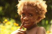 Young girl walking around in the kastom village after helping her mother weaving traditional baskets. Lekalangia, Tanna, Vanuatu.: by marysusan, Views[813]