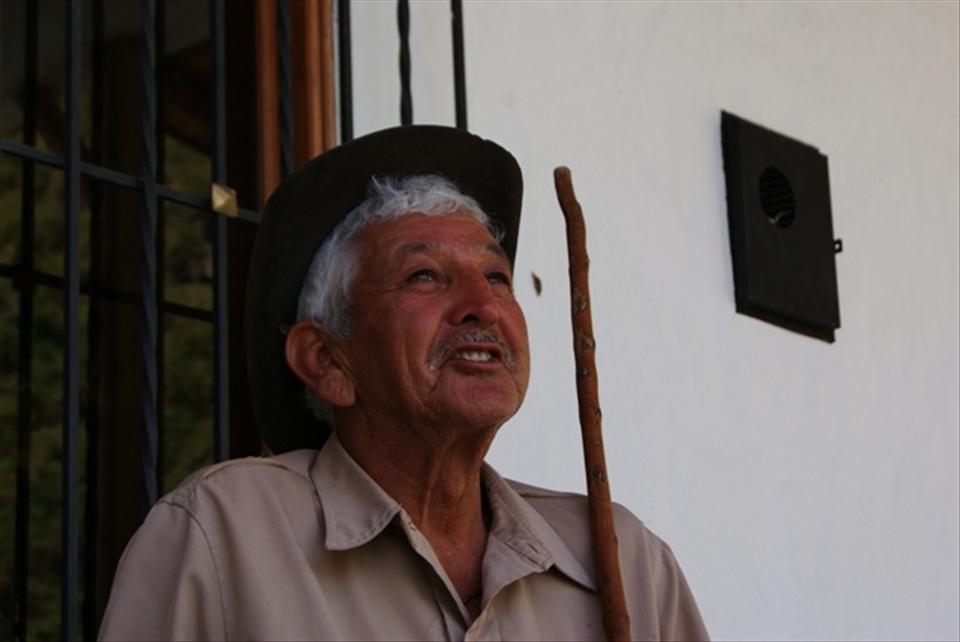 With a hoarse voice, the labourer describes the dream of a land he wishes to own. While he was staring at the sky, looking at the black vultures flying across the mountains he was telling me  that he could never trade his surroundings: the silence, the weather, the animals, the beautiful landscape... for anything.
