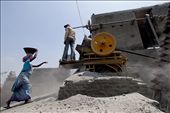 A women taking the stone to the crusher machine : by matlariver, Views[320]