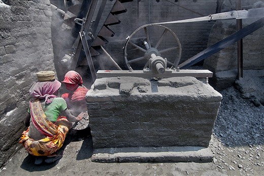 Collecting the stone dust .. which help local Cement manufactures to make Ceme. 