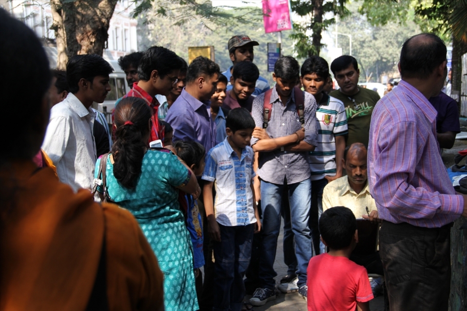 Bombay was a city of sporadic beauty and entertainment. While I was walking outisde of the Jehangir Art Gallery after seeing both tribal Bastar statues and contemporary Indian photography, I saw this cartoonist working his magic much to the delight of the locals who looked on with incredible interest. The cartoonist was one of many artists who sell their artwork outside of the gallery in a public art space for the passers-by to purchase.