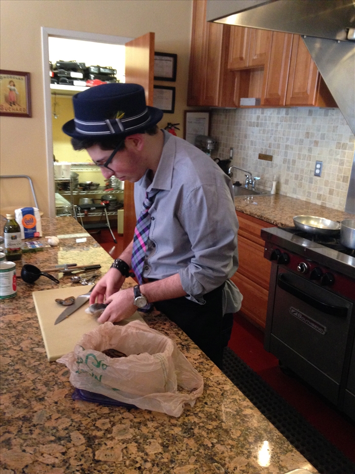 Choppin' up that lobster, yum! 