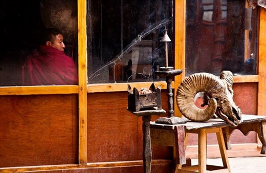 Buddhist rituals in a gompa near the city of Leh in Ladakh - India