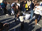 Washington Square Park is the site of many strange and otherwise unimaginable activities. Here locals of all ages knock around strangers in cushiony combat at the annual New York City pillow fight. Feathers fly and the remnants of busted pillows litter the ground, while some participants make battle clad in custom costumes.: by matthammen, Views[380]
