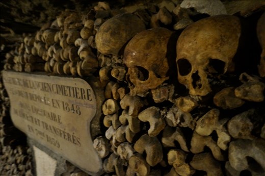 Back in the 1700's Paris ran out room in the cemeteries so they did the logical thing and started artistically stacking up old bones in the old salt mine tunnels below.