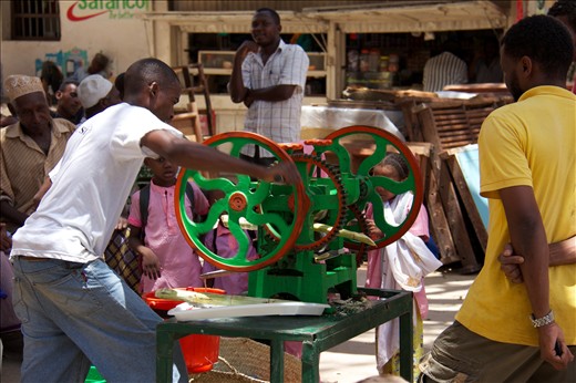 Making sugarcane juice in Lamu's market square.