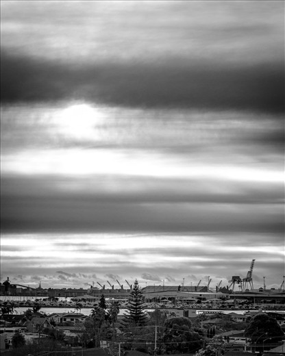 Oblivious to the giants surrounding us, civilization expands, forever occupied and isolated.