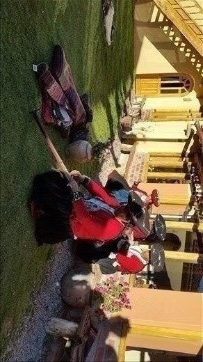 Weaving llama wool, all natural including the dyes.