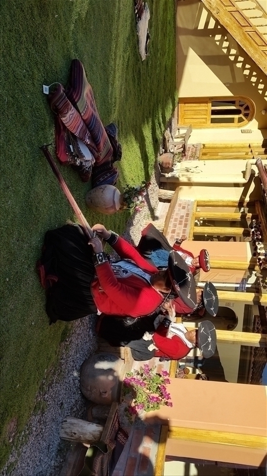 Weaving llama wool, all natural including the dyes.