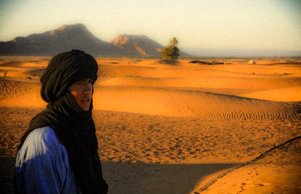 Man looks to the refuge of the mountains