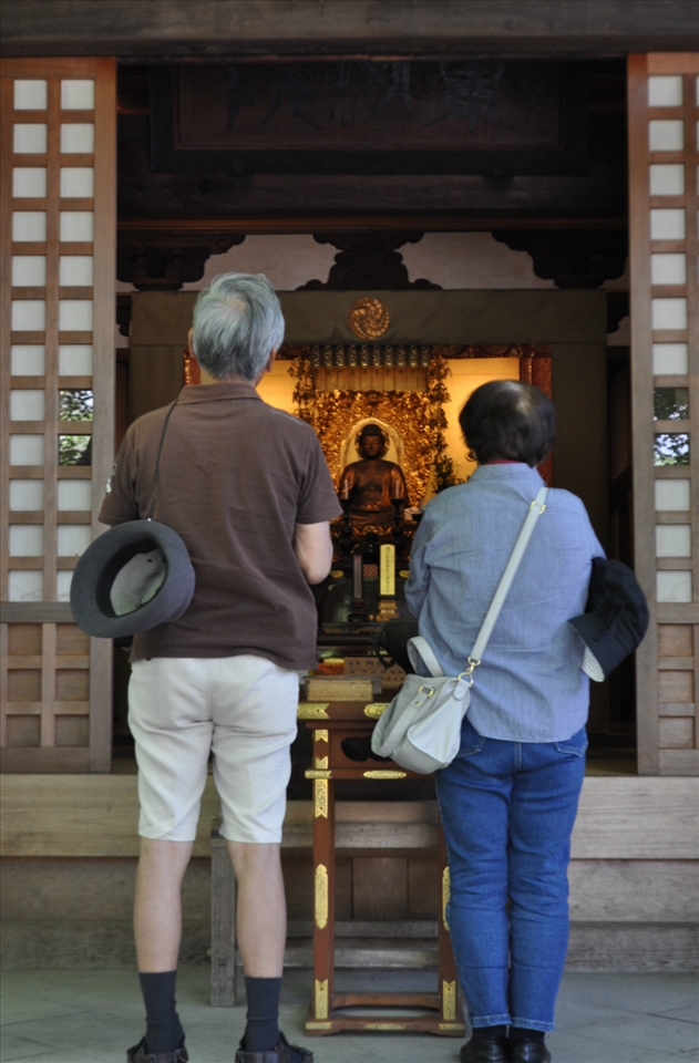 Silence is golden, especially for this couple in silent meditation.
