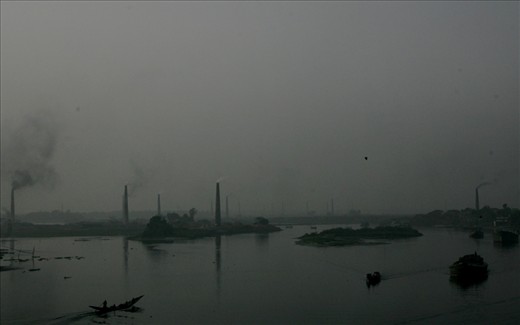 Factories and brick kilns mushroom on the encroached 'chors' (riverine islands) as the river is slowly murdered.