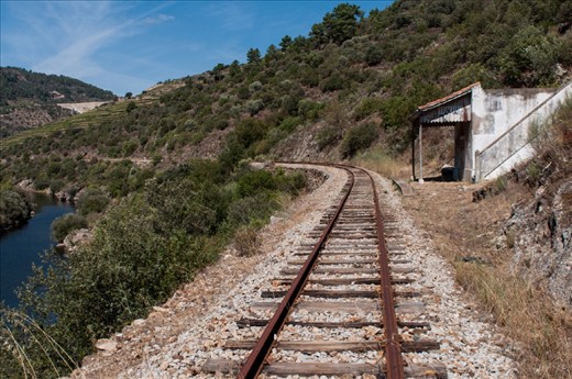 Time stopped here, where old train stations wait for the water to cover it